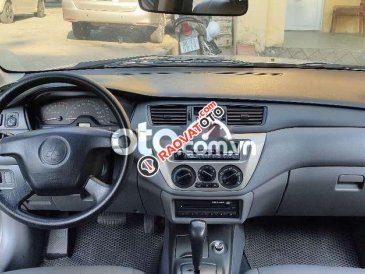 Bán Mitsubishi Lancer 1.6 AT sản xuất 2004, màu bạc như mới, giá chỉ 195 triệu