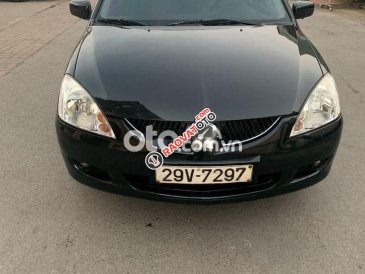 Xe Mitsubishi Lancer 1.6AT sản xuất 2004, màu đen, nhập khẩu 