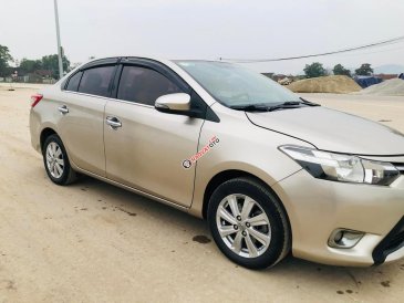 Cần bán xe Toyota Vios E năm sản xuất 2016, màu vàng