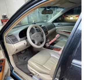 Cần bán lại xe Toyota Camry 3.0 V6 năm sản xuất 2005, màu đen 