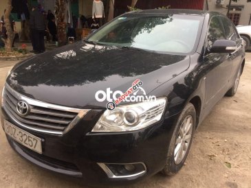 Cần bán lại xe Toyota Camry 2.4G sản xuất năm 2010, màu đen, giá tốt