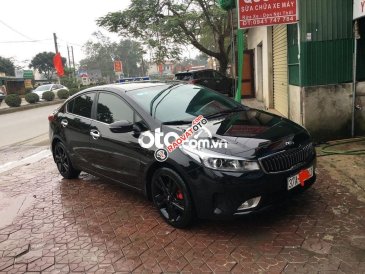 Cần bán lại xe Kia Cerato MT năm 2018, màu đen, xe nhập 