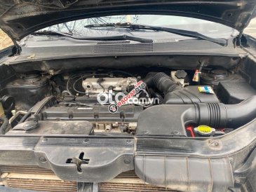 Cần bán gấp Hyundai Tucson 2.0 AT 4WD sản xuất 2009, màu đen, nhập khẩu Hàn Quốc