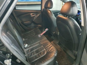 Bán Hyundai Tucson 2.0AT 4WD sản xuất 2011, màu đen, xe nhập
