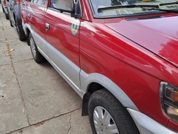 Cần bán xe Jolie Mitsubishi, loại 8 chỗ, đời cuối năm 2002, màu đỏ xịn (kèm các tấm hình chụp).