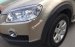 Cần bán xe Chevrolet Captiva LT 2.4 MT 2009, màu vàng