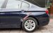 Bán lại xe BMW 3 Series 320i đời 2015, màu xanh