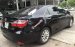 Cần bán lại xe Toyota Camry 2.0E đời 2015, màu đen