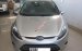 Cần bán Ford Fiesta 1.4 MT đời 2011, màu bạc xe gia đình