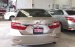 Bán xe Camry 2.0E sản xuất 2013, màu nâu vàng