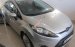 Cần bán Ford Fiesta 1.4 MT đời 2011, màu bạc xe gia đình