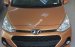 Bán Hyundai Grand i10 CKD 2018 vàng cam, giá nét giao ngay, khuyến mãi đầy đủ