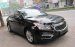 Cần bán Chevrolet Cruze LT 1.6 2016, màu đen số sàn, 445 triệu