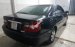 Bán Toyota Camry 2.4G 2002, màu đen, giá 310tr