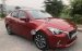 Cần bán xe Mazda 2 sản xuất 2016, màu đỏ số tự động