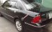 Bán Ford Laser Ghia 1.8 năm 2004, màu đen số sàn