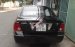 Bán Ford Laser Ghia 1.8 năm 2004, màu đen số sàn