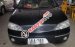 Cần bán gấp Ford Laser Ghia 1.8 sản xuất 2004, màu đen chính chủ
