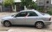Bán Ford Laser Ghia 1.8MT đời 2003, màu bạc