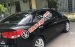 Cần bán gấp Kia Forte Sli 2010, màu đen