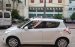 Cần bán xe Suzuki Swift 1.4 AT năm 2013, màu trắng, xe nhập chính chủ, giá 415tr