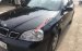Cần bán xe Daewoo Lacetti MT đời 2004, màu đen, giá tốt