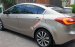 Bán Kia K3 1.6 AT số tự động model 2014, Sx 2013, màu vàng 1 đời chủ mới 90%