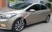 Bán Kia K3 1.6 AT số tự động model 2014, Sx 2013, màu vàng 1 đời chủ mới 90%