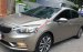 Bán Kia K3 1.6 AT số tự động model 2014, Sx 2013, màu vàng 1 đời chủ mới 90%