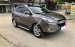 Bán xe Hyundai Tucson 4WD đời 2011, màu nâu, nhập khẩu nguyên chiếc, giá chỉ 500 triệu