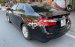 Cần bán Toyota Camry 2.0E 2013, màu đen chính chủ, giá tốt