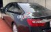 Cần bán lại xe Toyota Camry 2.0E sản xuất 2014, màu đen chính chủ