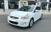 Cần bán xe Hyundai Accent 1.4 AT sản xuất 2013, màu trắng, nhập khẩu Hàn Quốc