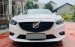 Cần bán gấp Mazda 6 2.0L đời 2016, màu trắng chính chủ