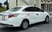 Cần bán Toyota Vios J đời 2014, màu trắng còn mới, giá tốt