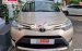 Cần bán lại xe Toyota Vios 1.5E sản xuất 2016, màu vàng