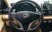Cần bán xe Toyota Vios E năm sản xuất 2016, màu vàng