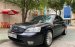 Bán Ford Mondeo 2.5 V6 năm 2005, màu đen, 210tr