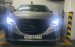 Xe Mazda 3 2.0 2015 để lại 1 đóng đồ chơi theo xe.